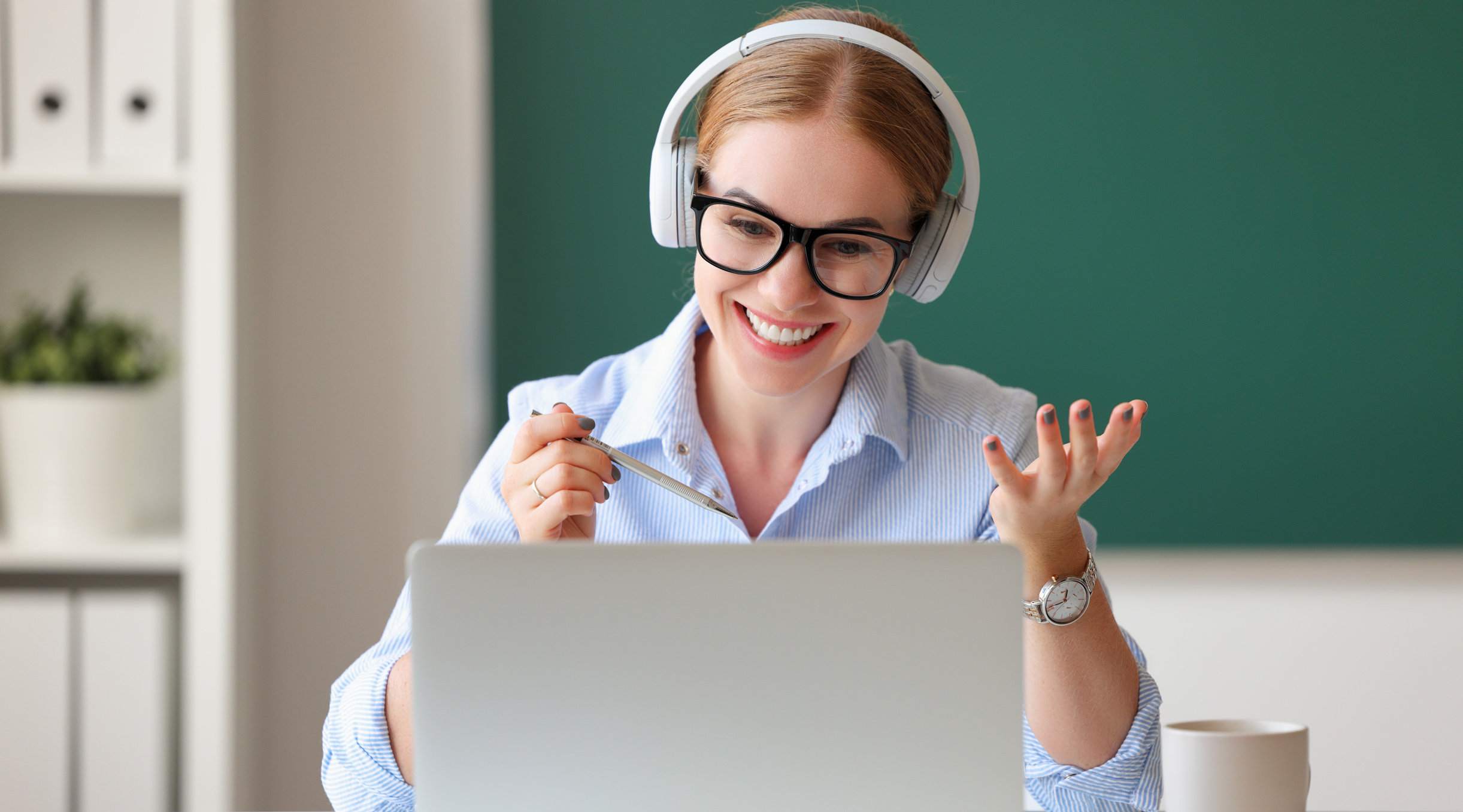 Female teacher during online lesson in classroom